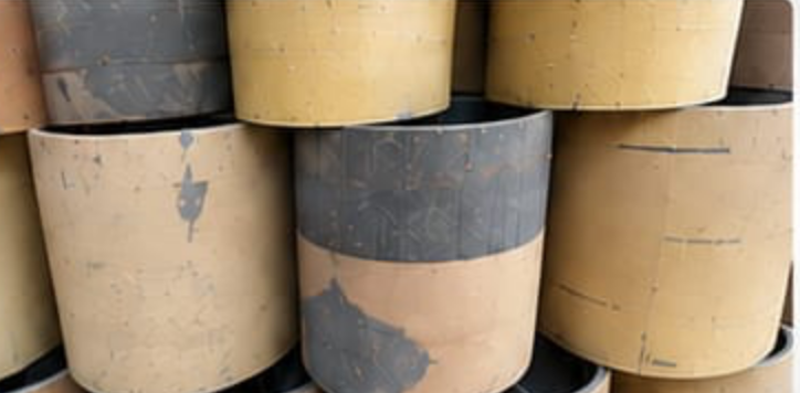 Old re-rubbered drums — not our product
